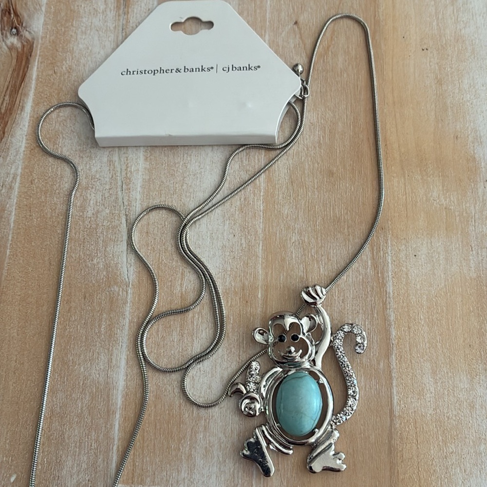 NWT CJ Banks Silver Monkey Pendant Necklace with Blue Stone